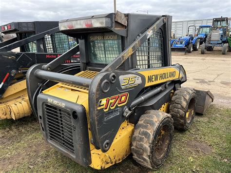 2007 new holland l170 skid steer|new holland ls170 cab tilting.